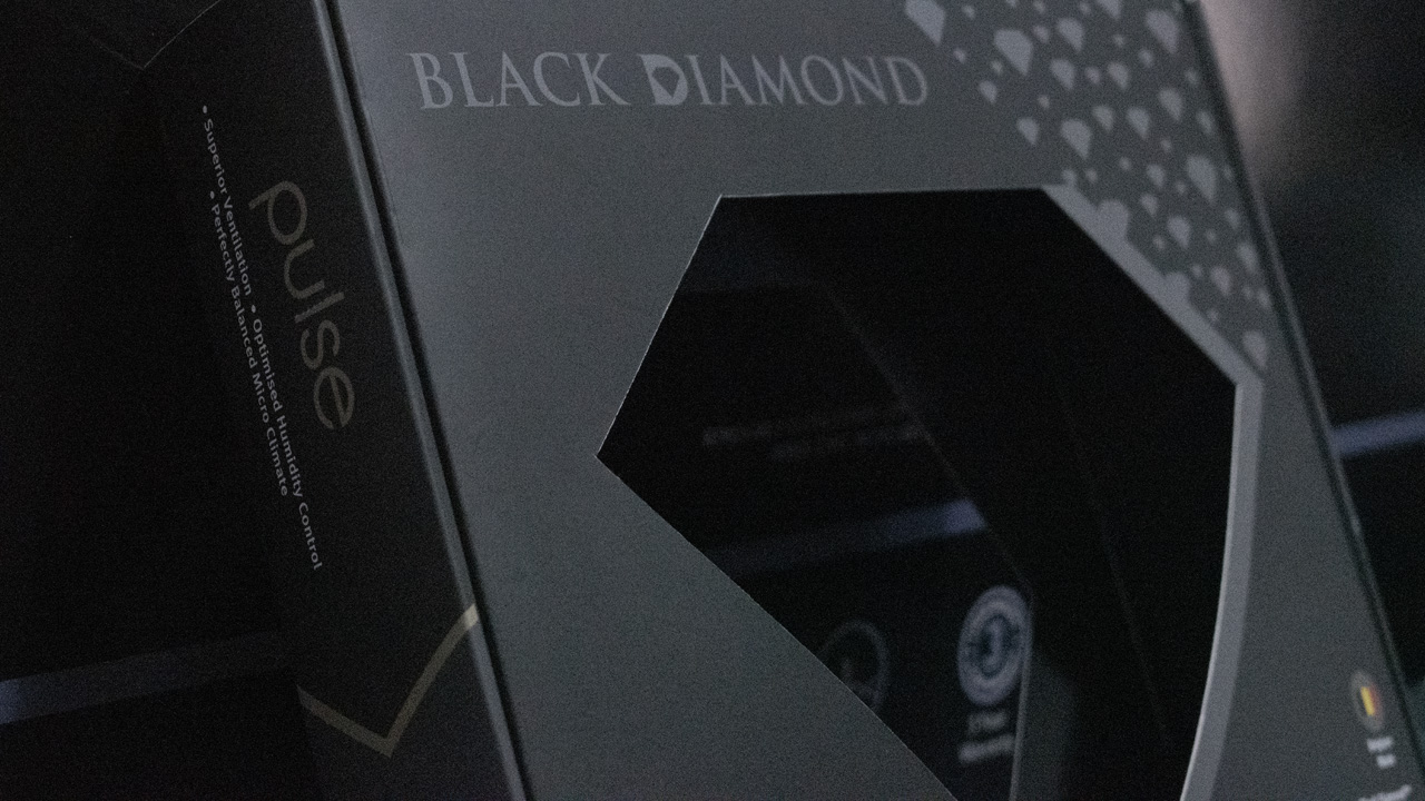 Close up of Black Diamond bespoke sample box, featuring diamond cut out.
