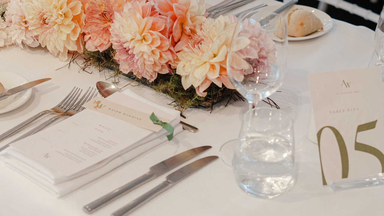 Photography of Annalise & Wess' place setting & table number card.