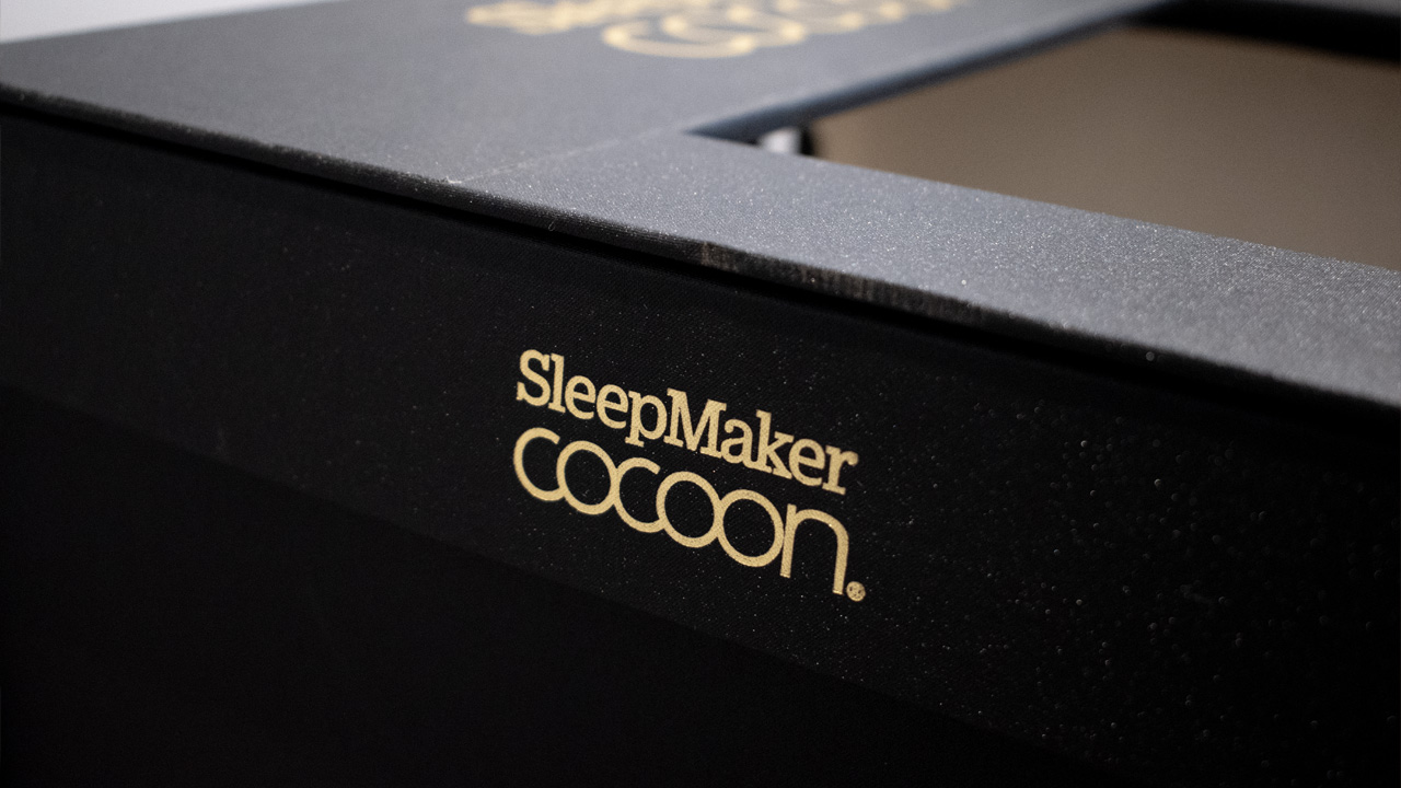 Close up of SleepMaker Cocoon sample box, featuring gold foiling.